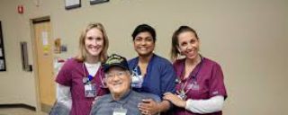 Howard County General Hospital staff with patient
